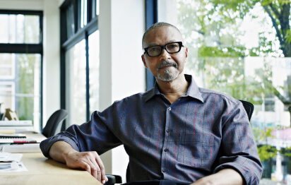 man sitting at desk